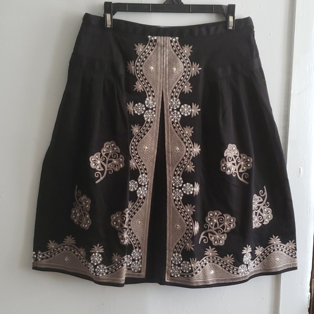 WD.NY  embroidered with a beaded skirt.